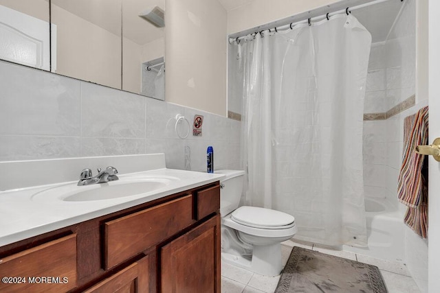 full bathroom featuring tile patterned flooring, backsplash, toilet, vanity, and tile walls