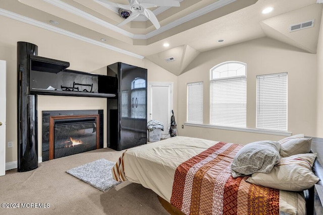 bedroom with ceiling fan, crown molding, and light carpet