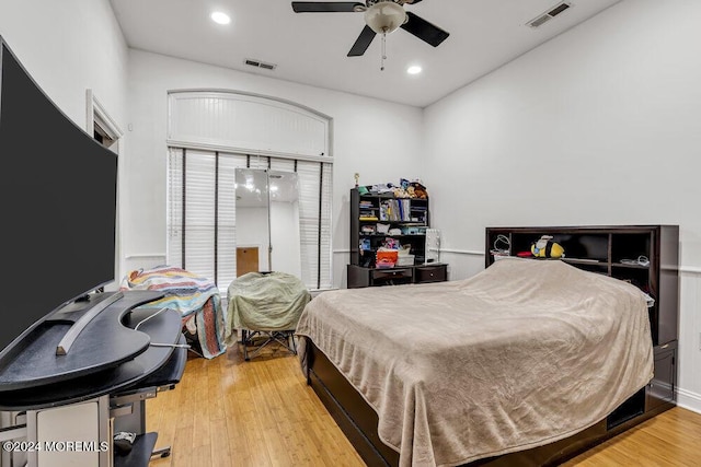 bedroom featuring ceiling fan and light wood-type flooring