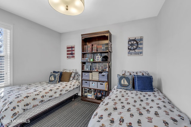 bedroom featuring carpet