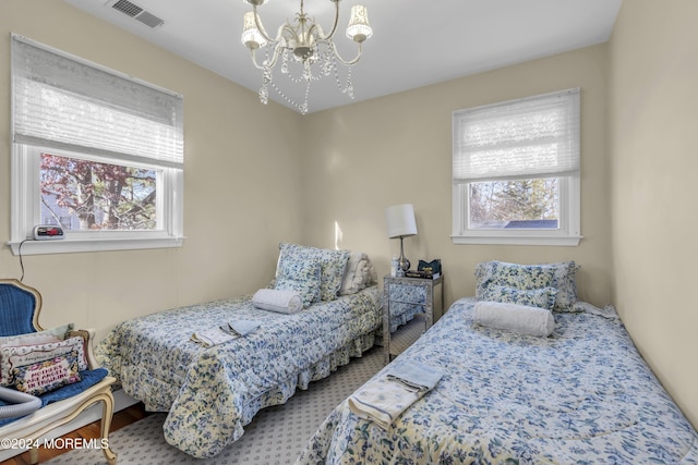 bedroom with a chandelier