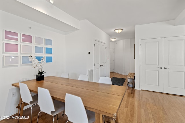 dining room featuring light wood-type flooring