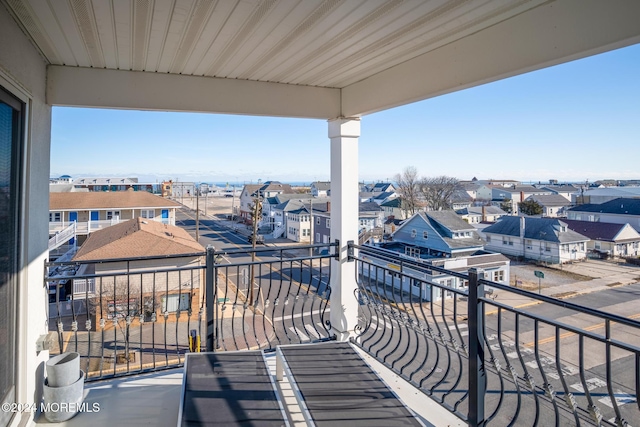 balcony featuring a residential view