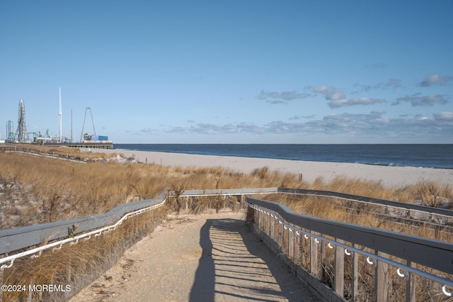 view of home's community with a view of the beach and a water view