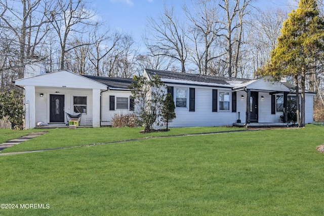 ranch-style house featuring a front lawn