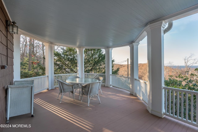 exterior space featuring ornate columns