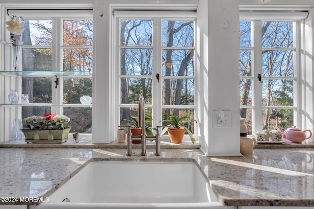 interior space with a sink and plenty of natural light