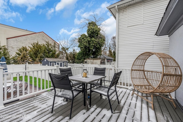 deck with a shed