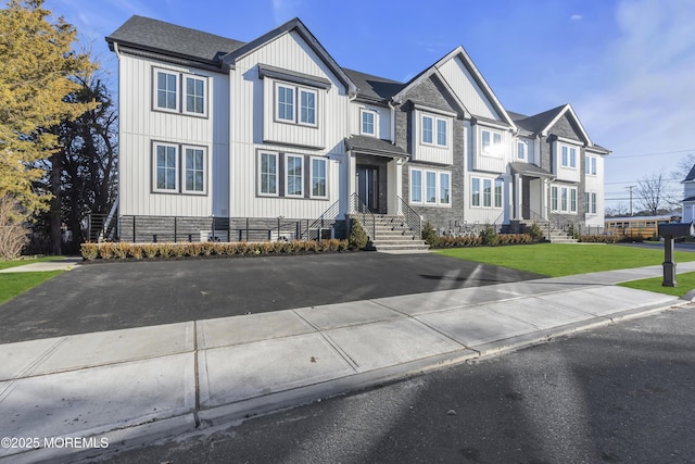 view of front of home with a front yard