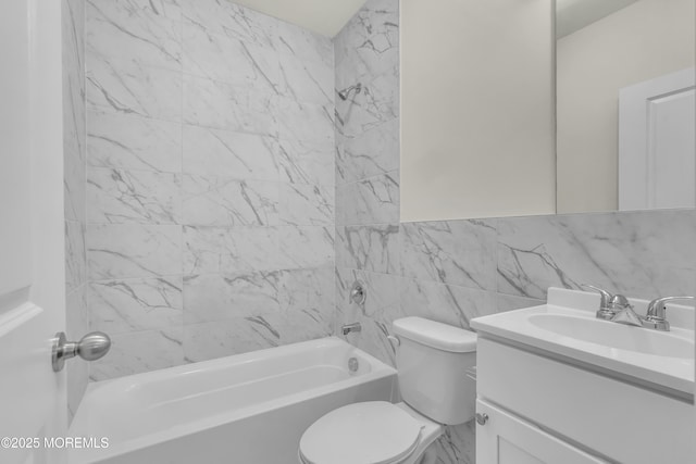 full bathroom featuring backsplash, bathtub / shower combination, vanity, tile walls, and toilet