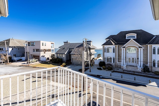 balcony featuring a residential view