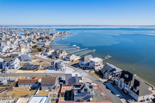 aerial view with a water view and a residential view