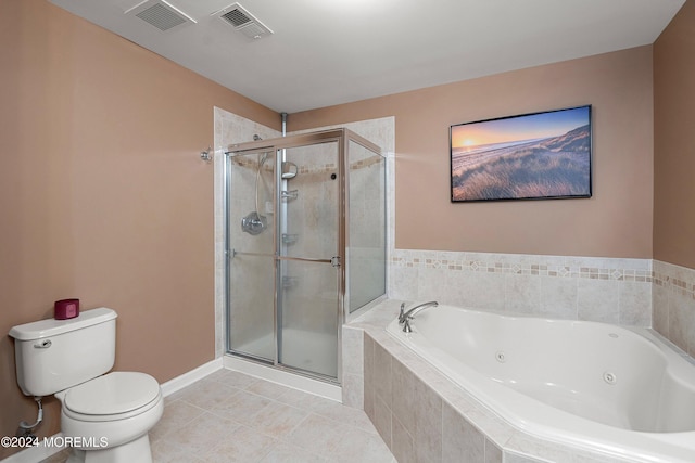 bathroom featuring tile patterned flooring, independent shower and bath, and toilet