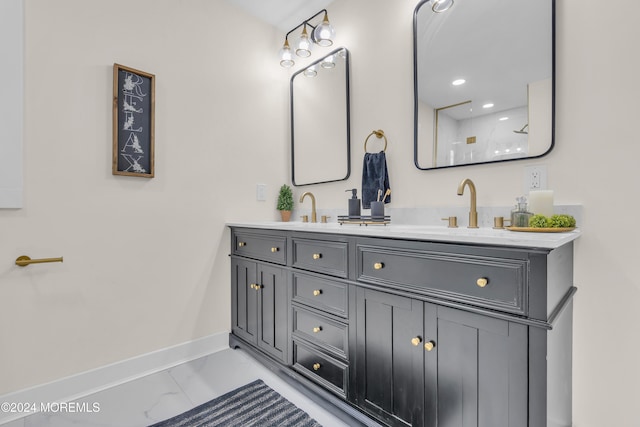 bathroom with vanity and a shower