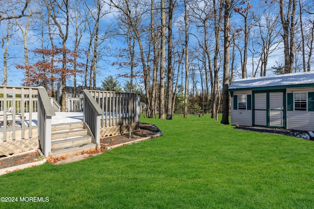 view of yard featuring a wooden deck