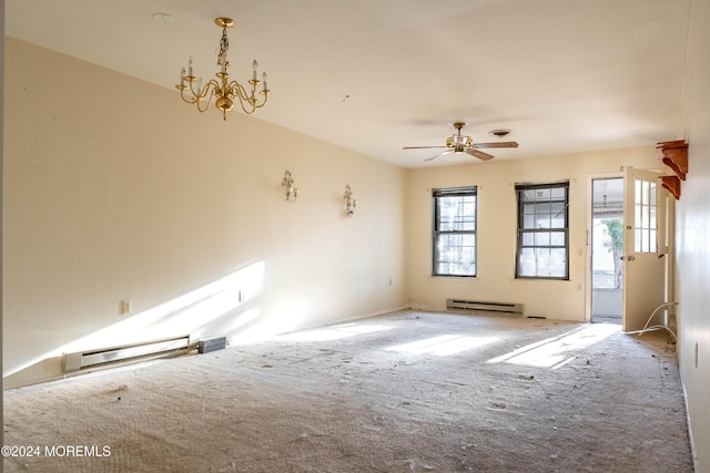 spare room featuring a baseboard radiator and ceiling fan with notable chandelier