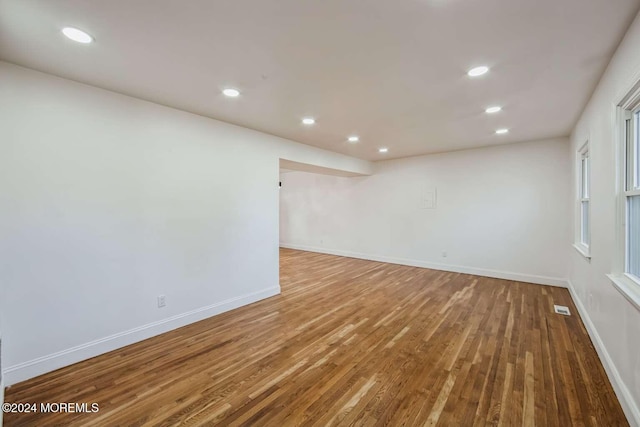 empty room with wood-type flooring