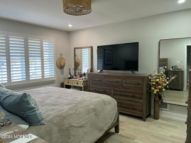 bedroom featuring light hardwood / wood-style floors