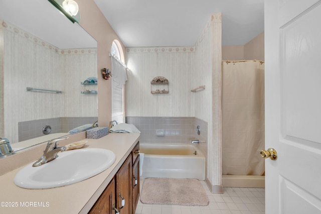 bathroom with vanity and separate shower and tub