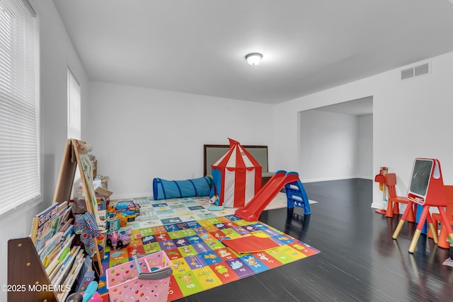 bedroom with hardwood / wood-style floors