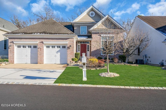 view of front facade featuring a front lawn and a garage