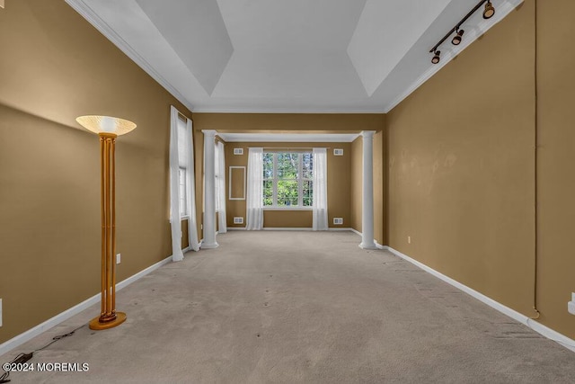 interior space with crown molding, light carpet, and lofted ceiling