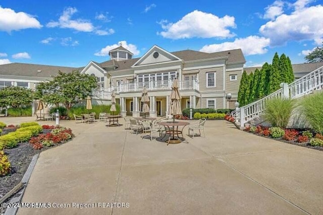 back of house featuring a patio