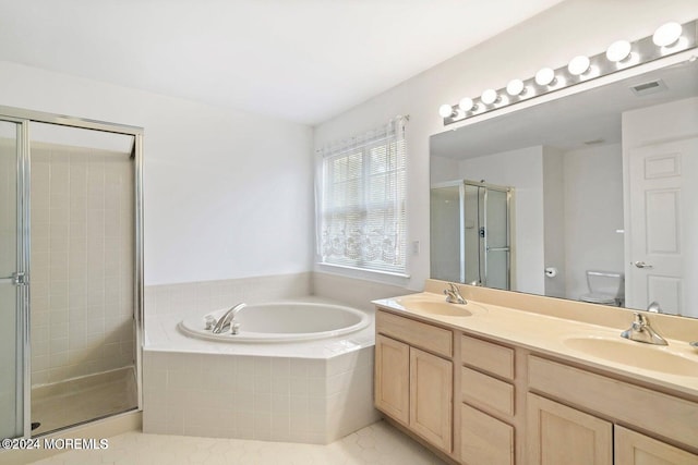 full bathroom featuring separate shower and tub, tile patterned flooring, vanity, and toilet