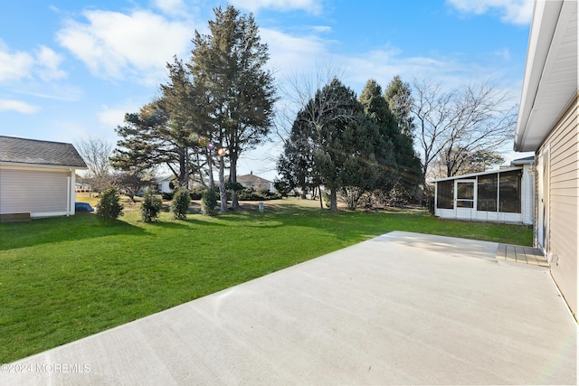 view of patio with a sunroom