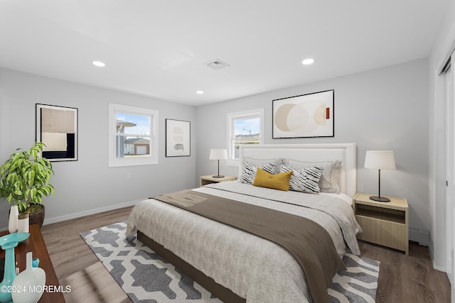 bedroom with wood-type flooring