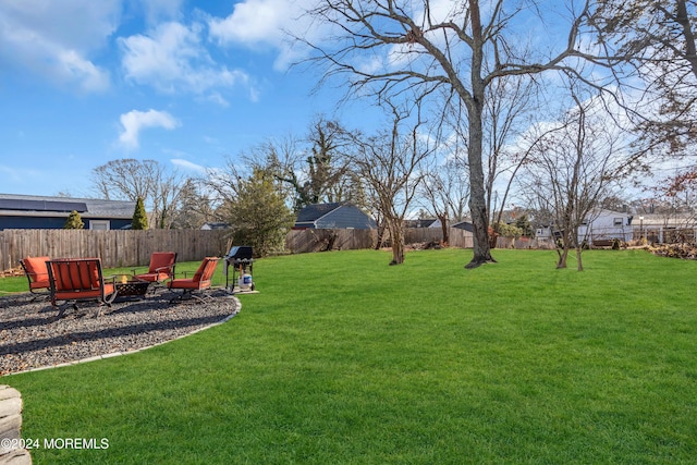 view of yard featuring a fire pit