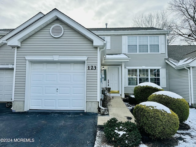 view of front of property featuring a garage