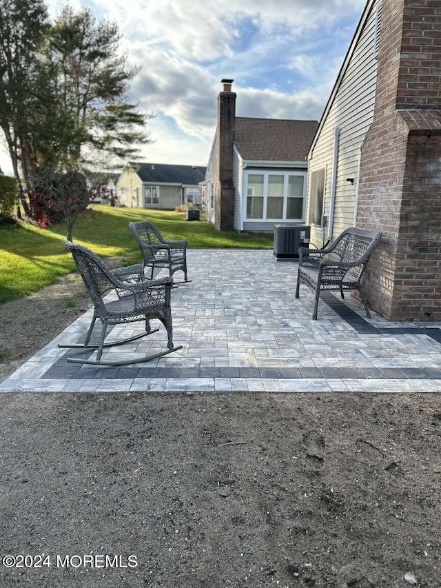 view of patio with central air condition unit