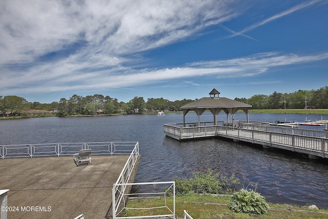 dock area featuring a gazebo and a water view