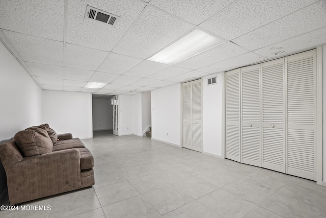 interior space featuring a paneled ceiling