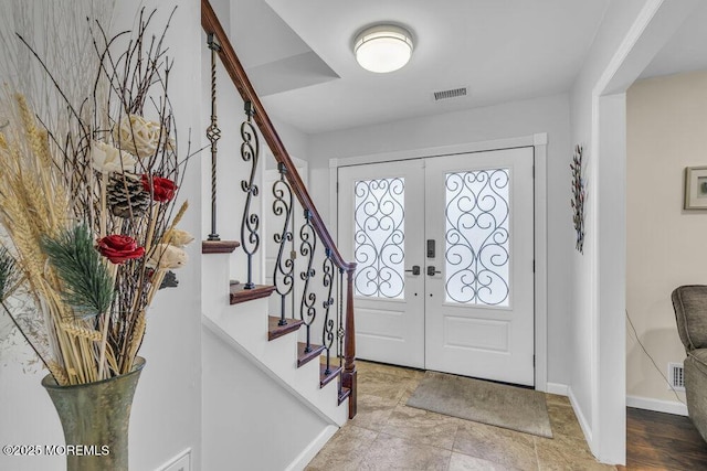 foyer featuring french doors