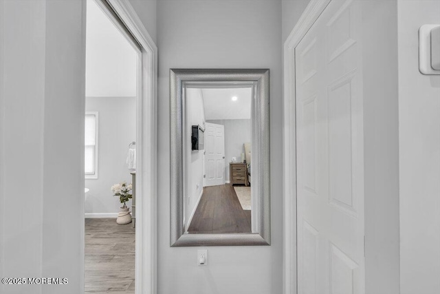 hallway featuring hardwood / wood-style floors