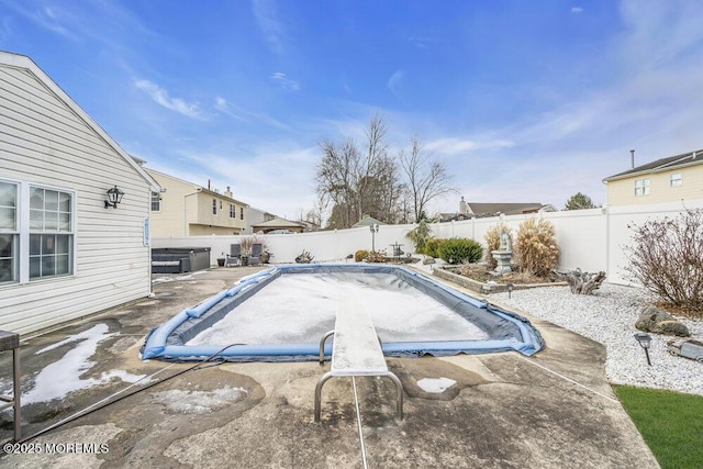 view of pool featuring a patio