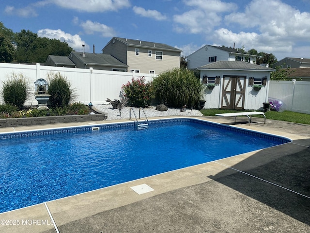 view of swimming pool featuring a storage unit