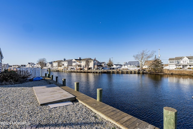 dock area featuring a water view