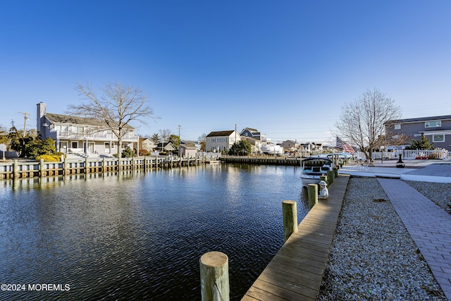 view of dock with a water view