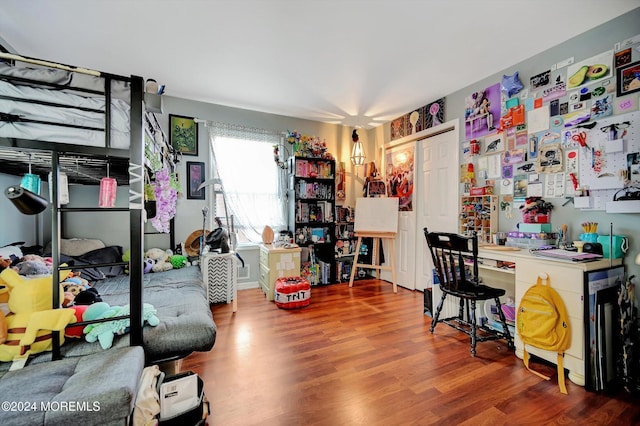 bedroom with wood-type flooring