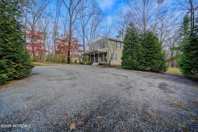 view of home's exterior featuring a porch