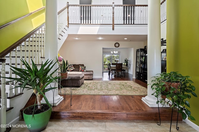 entrance foyer with a high ceiling and a notable chandelier