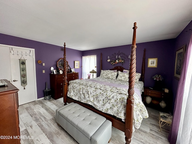 bedroom with light hardwood / wood-style floors