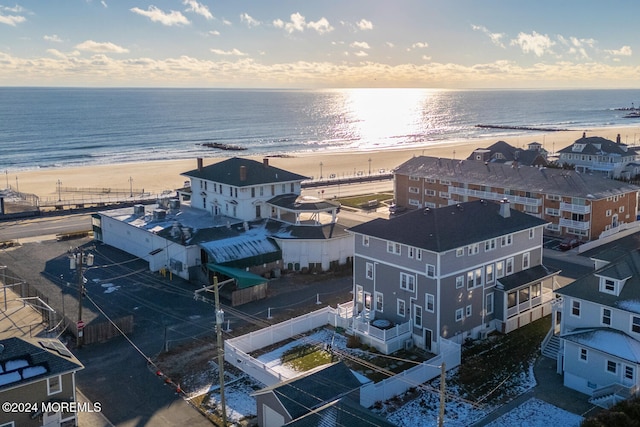 aerial view with a beach view and a water view