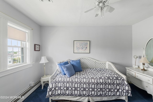 bedroom featuring carpet, a baseboard radiator, and ceiling fan