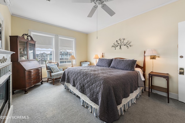 bedroom with ceiling fan, carpet floors, and ornamental molding