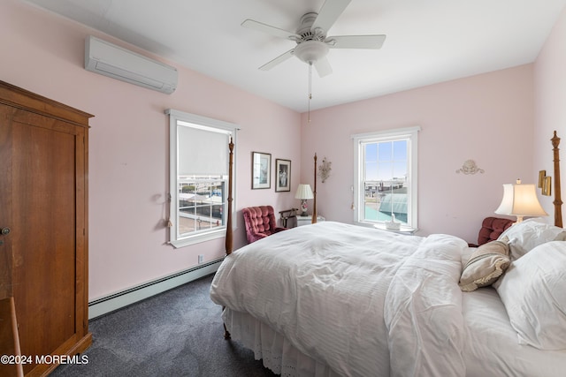 carpeted bedroom with ceiling fan, an AC wall unit, and a baseboard heating unit