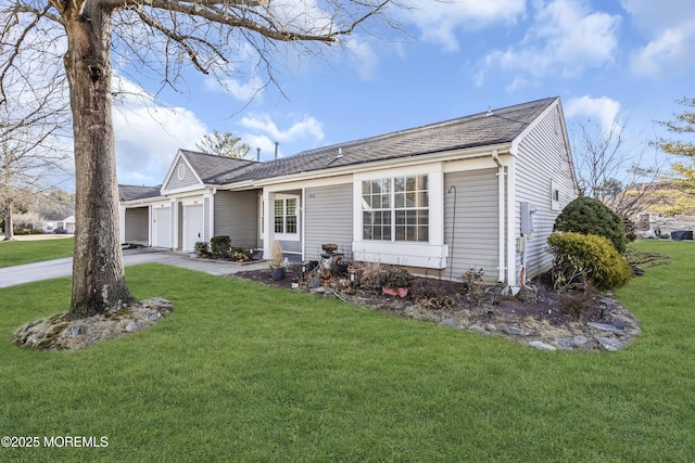 single story home with a front lawn and a garage